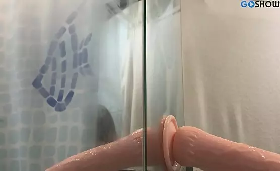 Drenched Dildo Delights Under Steamy Shower